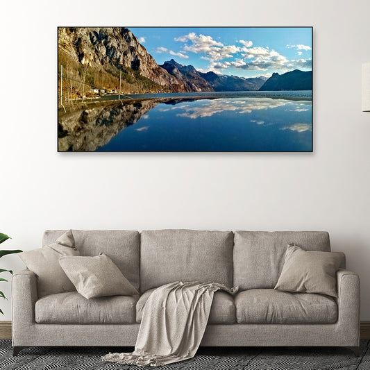 Beautiful Calm Lake Surrounded by Hills Under a Blue Sky Canvas Wall Painting