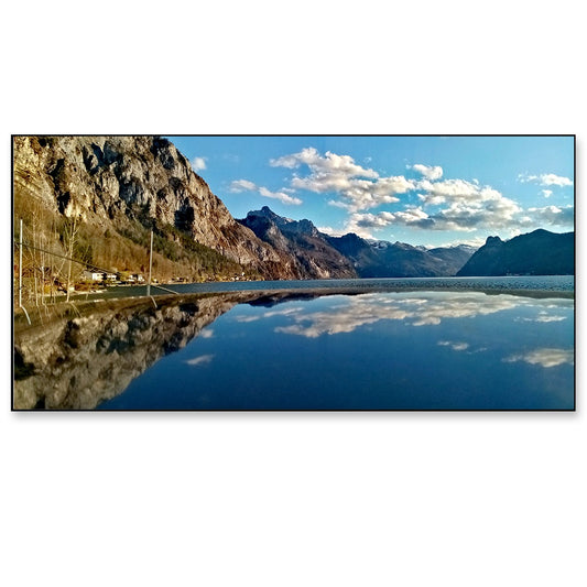 Beautiful Calm Lake Surrounded by Hills Under a Blue Sky Canvas Wall Painting